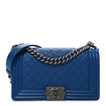 Caviar Quilted Medium Boy Flap Dark Blue