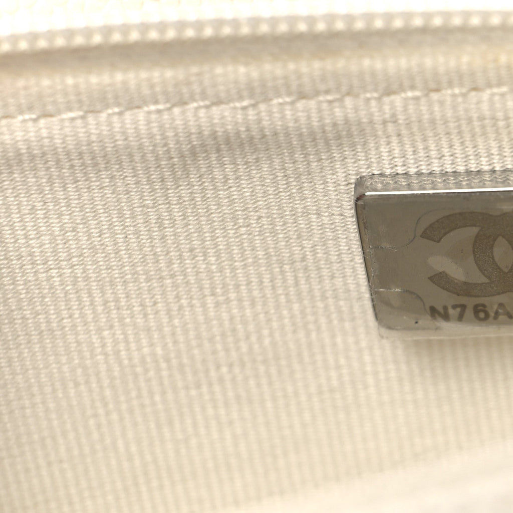 Shiny Caviar Quilted Flap Charm Wallet On Chain WOC White