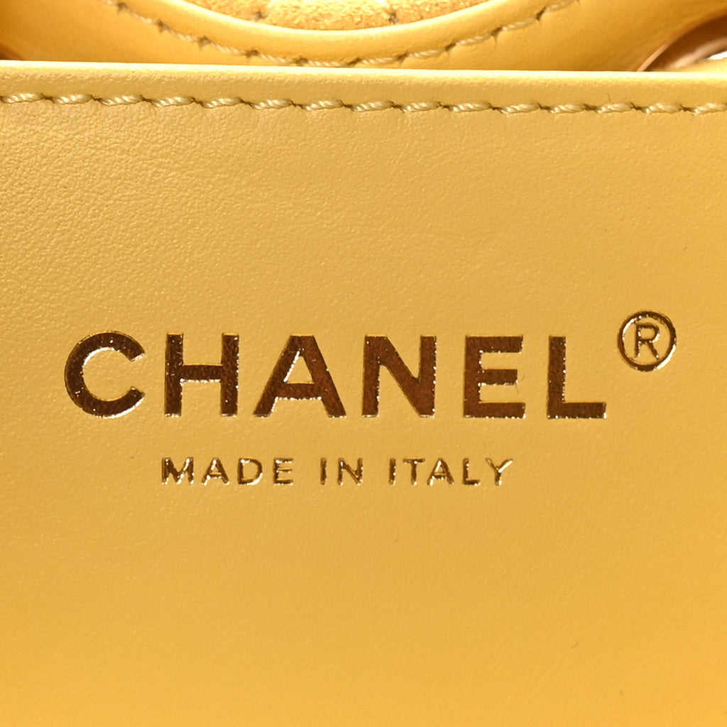 Suede Quilted Mini Chanel 25 Handbag Yellow