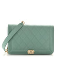 Caviar Quilted Boy Wallet On Chain WOC Light Blue