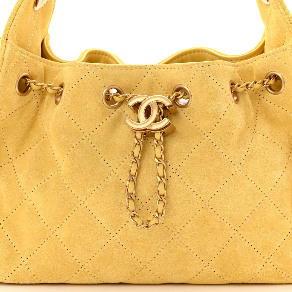 Suede Quilted Mini Chanel 25 Handbag Yellow