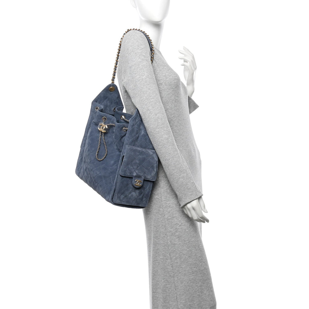 Suede Quilted Medium Chanel 25 Handbag Blue