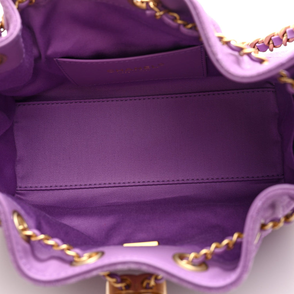 Suede Quilted Mini Chanel 25 Handbag Purple