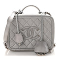 Metallic Caviar Quilted Medium CC Filigree Vanity Case Silver