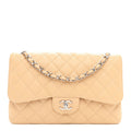 Caviar Quilted Jumbo Double Flap Beige Clair