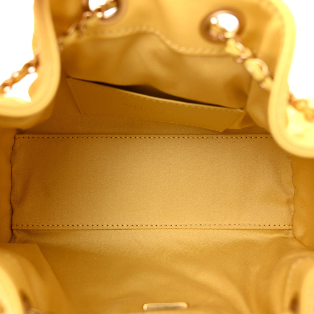 Suede Quilted Mini Chanel 25 Handbag Yellow