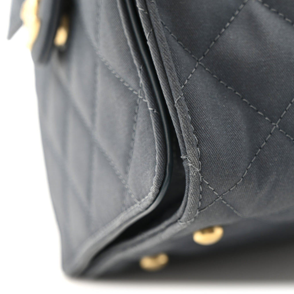 Canvas Quilted Medium Chanel 25 Handbag Dark Blue