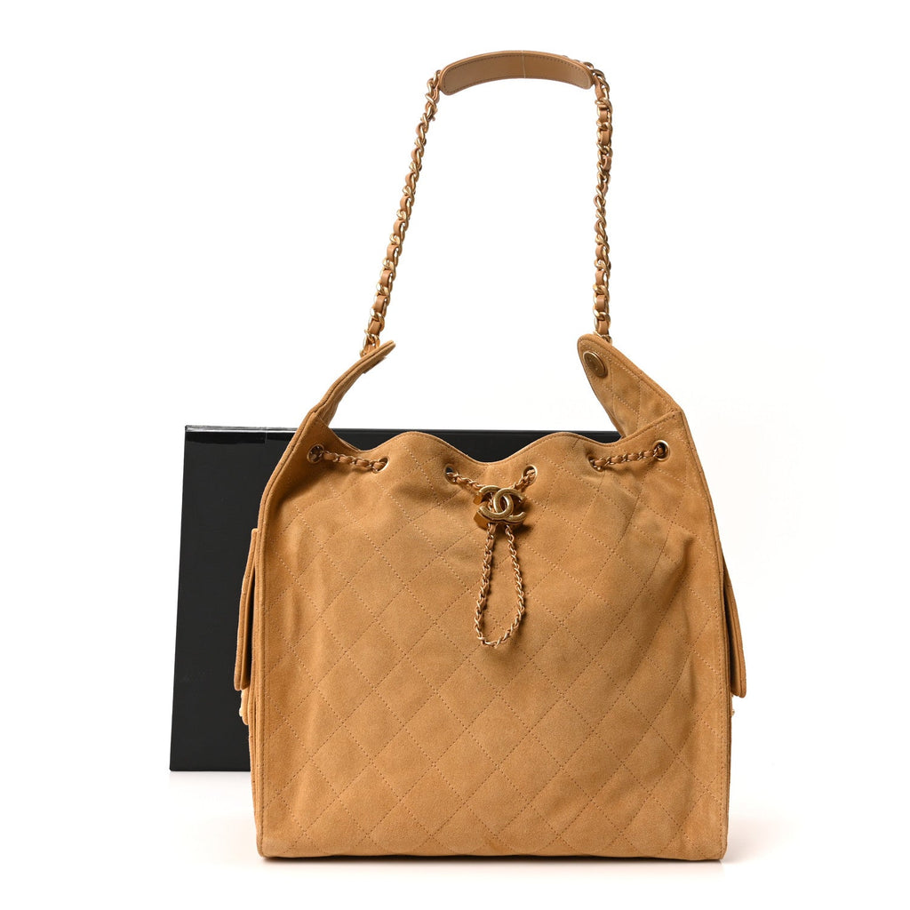 Suede Quilted Medium Chanel 25 Handbag Beige