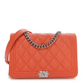 Caviar Quilted Boy Wallet On Chain WOC Orange
