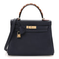 Togo Horseshoe Au Galop Kelly Retourne 28 Bleu Nuit Rouge H Fauve