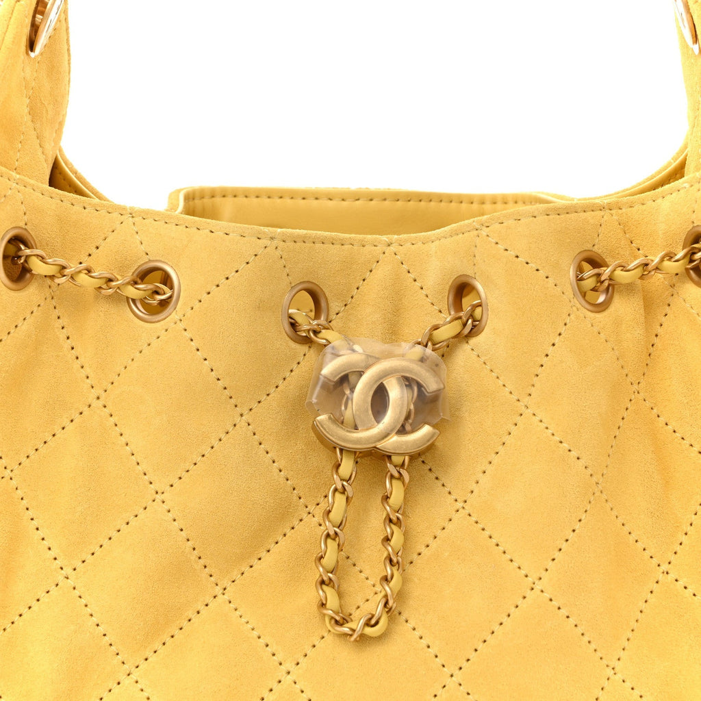 Suede Quilted Mini Chanel 25 Handbag Yellow