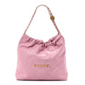 Shiny Calfskin Quilted Chanel 22 Drawstring Bag Pink