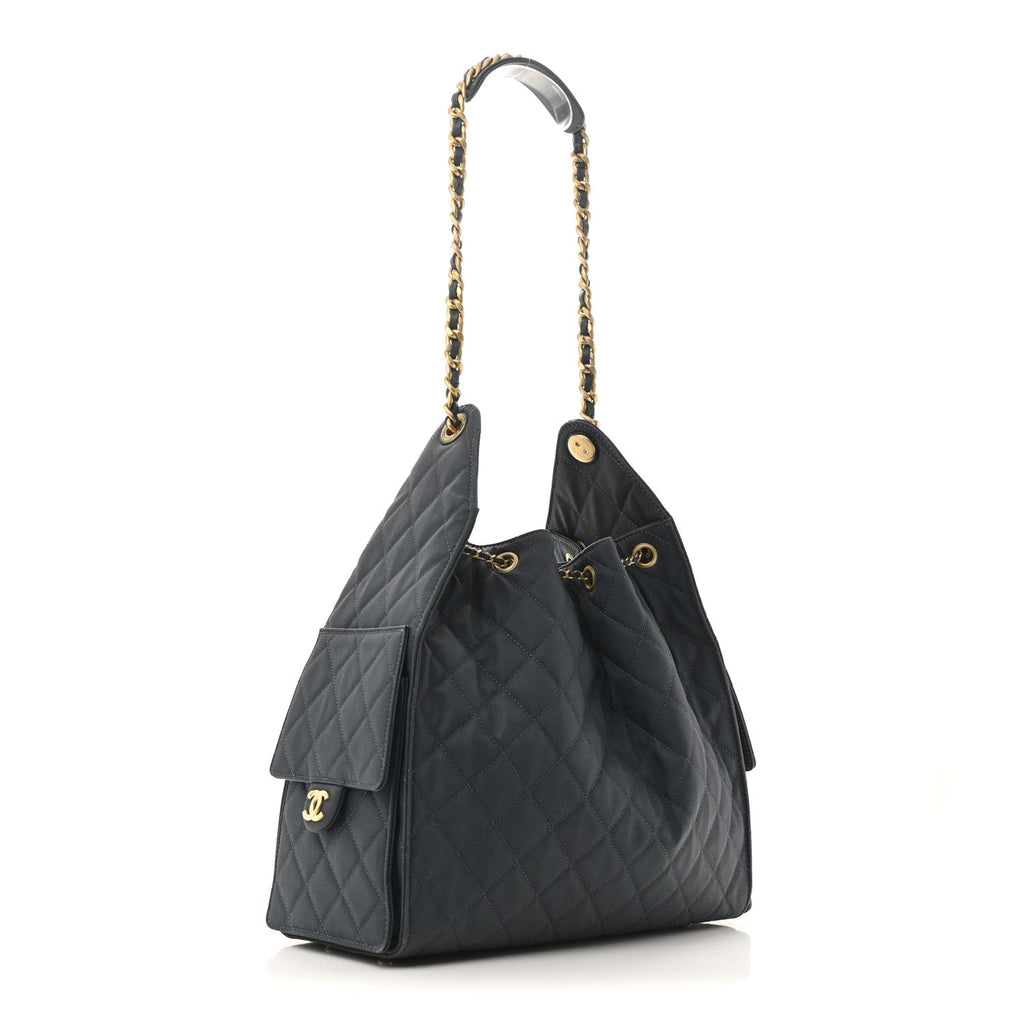 Canvas Quilted Medium Chanel 25 Handbag Dark Blue
