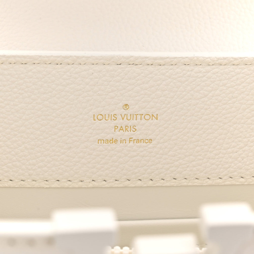 Taurillon Capucines East West MM Optic White