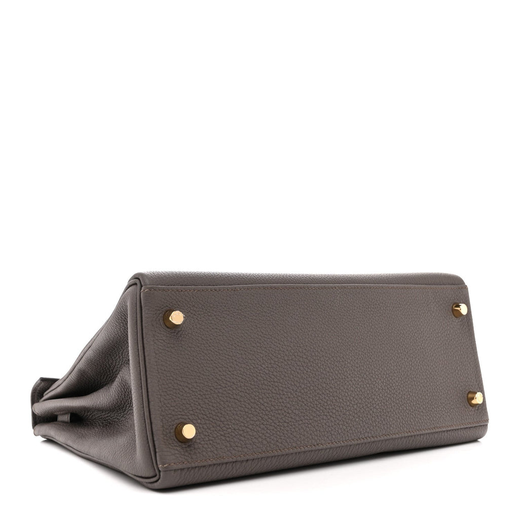 Togo Kelly Retourne 28 Etain