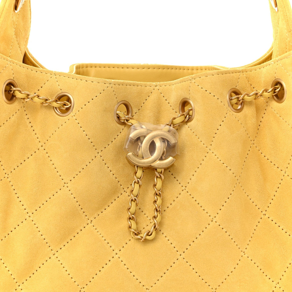 Suede Quilted Mini Chanel 25 Handbag Yellow